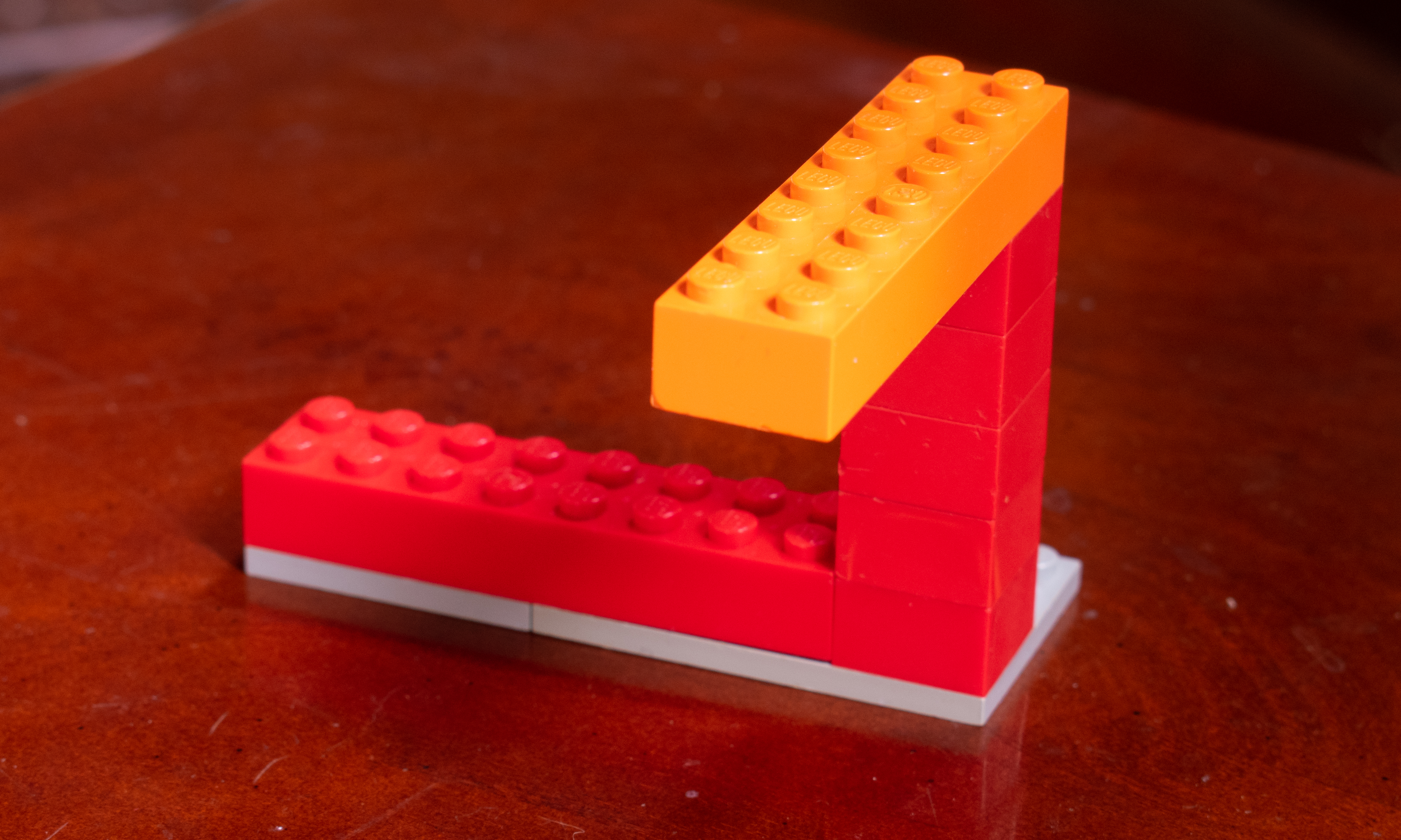 An impossible triangle built out of lego revealed.